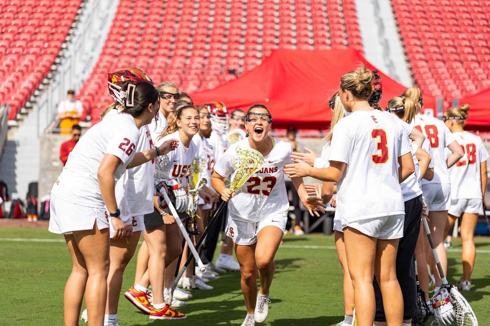 College lacrosse players in action during a game